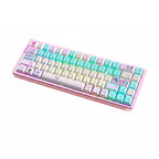 Pastel pink and green anime keycaps set with Japanese legends on a compact mechanical gaming keyboard.